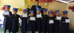 Group in Pacoxpon, San Martin; with their teacher