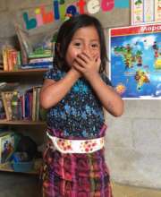 Shy student at a rural community classroom