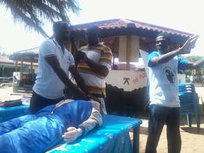 A Red Cross team demonstrates how to do CPR
