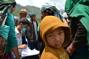 Victims of the earthquake with HHC's relief team