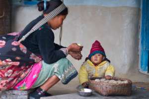 A mother with her baby in the Dhading villages
