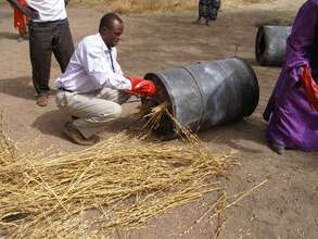 Aquilas Dadje doing a pyrolysis demonstration