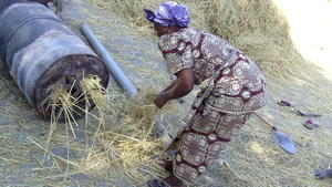 Tilo member preparing a kiln.