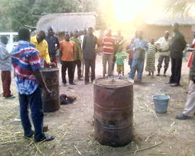 Tilo villagers and Kosguelbe Team observing.