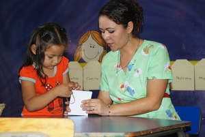 Montessori guide Lucia and young girl