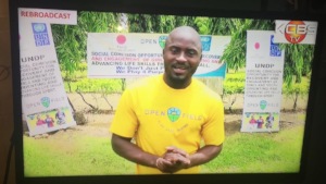 Community Leader, Bidias, leading a TV segment