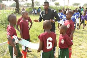 Junior leaders educating their peers at the field.