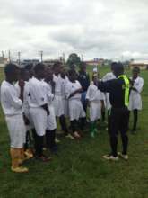 Players engage referee to refresh coaches' lesson