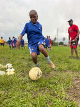 Gina showing her football skills
