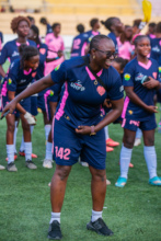 Seyni and players join the dance