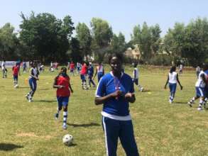 A coach supervises drills