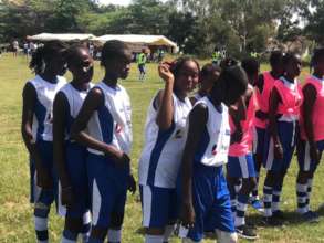 Girls line up to do soccer drills in Thies