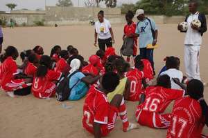 P.E. Teacher, Coach in Thies mentoring her team