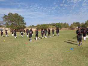 Practicing drills to teach players.