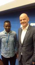 Seyni with FIFA President Gianni Infantino.