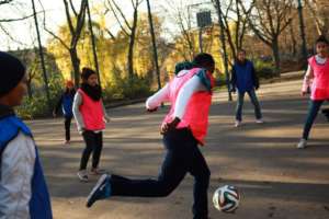 The women coaches get to play some street soccer!