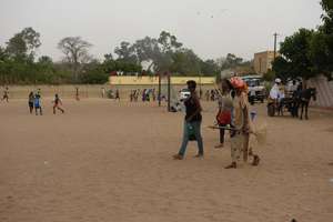 Women leaving the field to the boys