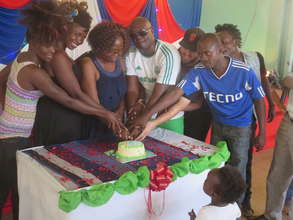 Ceremonial cake-cutting at Laughter Mania