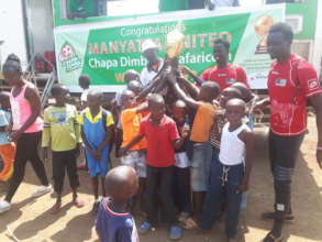 Champions celebrating with our youth on the way up
