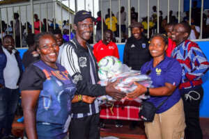Coaches & Staff happy for program donations