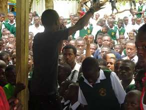 Gabiro performs at a secondary school