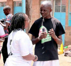 General Manager Oballah confers with the community