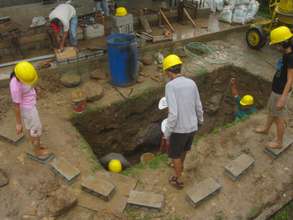Agriculture Volunteers Finish Septic Tank