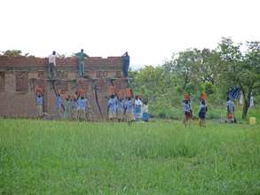 Cubu School construction workers hard at work-June