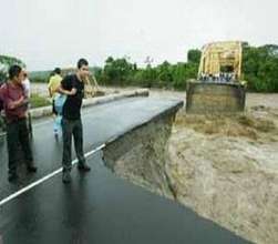 Bridge and Road are Washed Away