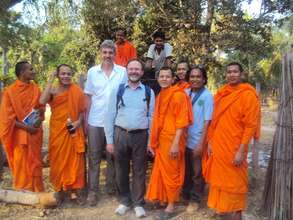 Monks of BFT standing with BFT volunteers