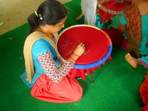 A women in Embrodary training program.