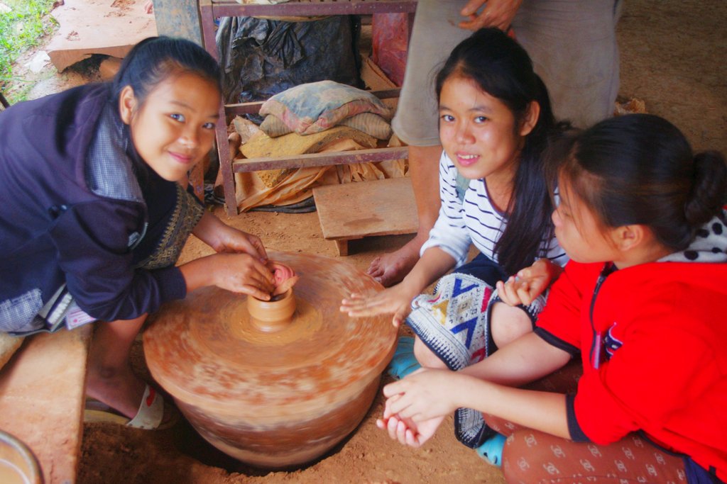 Making a clay pot at the Pottery Village