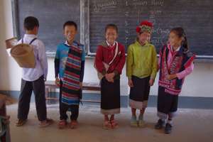 Students demonstrate wearing ethnic clothing.