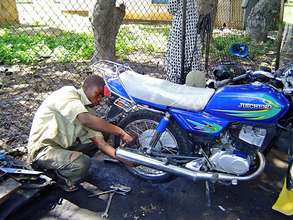 Motorcycle beneficiary at work