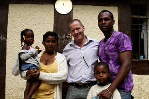 A student and his family with Shai Reshef