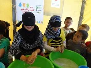 Children playing the hand-washing game