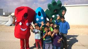 Our 'hygiene mascots' with children