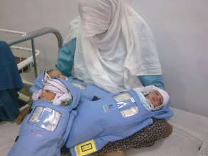 Afghan Triplets with their mother