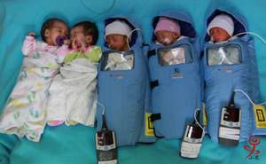 Tiny infants in the Embrace warmer