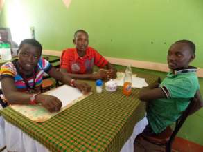 Scholarship winners Felister, Matthew & Innocent