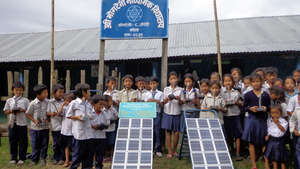 students with solar lamp