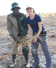 Hannah and the village Headman gathering twigs.