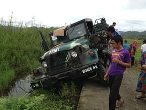 AAI relief truck slides off road