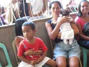 Families receive AAI-IPI relief meds June 1, 2013