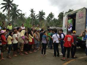 Lining up at relief truck