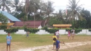 Playing Badminton outside the library