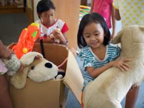 The children playing along with the toys