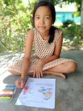 The library member coloring the worksheet