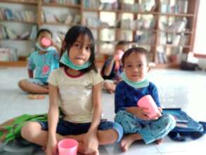 "Thank you GlobalGiving donors", Ayu & her brother