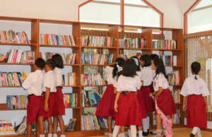 The students enjoy looking for their fave books